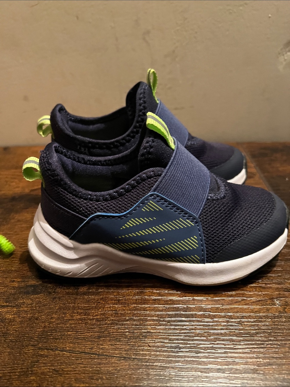 Boys size 7 Navy Slip-On Athletic Sneakers with Lime Accents